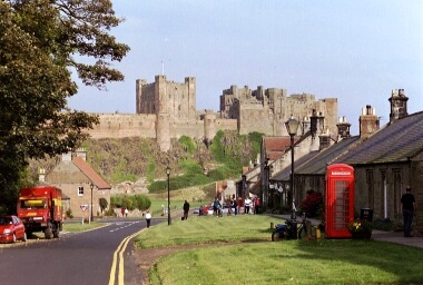 10 nights Newcastle to Edinburgh Coast and Castles
Bamburgh village with a castle background